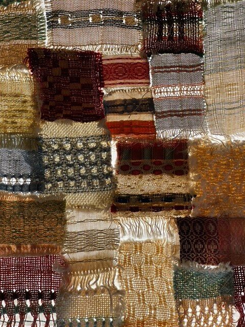 Collection of small woven samples stitched together, showing a variety of weave structures and textures at the Little Loomhouse.