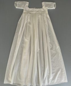 Cream colored christening gown after treatment.