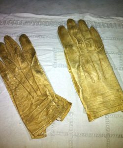 Frederick Douglass badly discolored gloves before restoration.