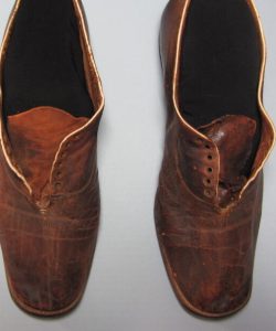 Pair of restored mahogany brown leather shoes worn by Frederick Douglass