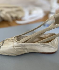 Mother Seton's ivory silk slipper during treatment process.