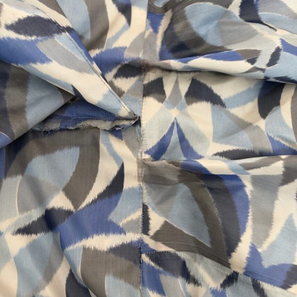 silk fabric in abstract leaf print after repair